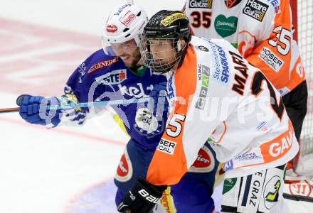 EBEL. Eishockey Bundesliga. EC VSV gegen Moser Medical Graz 99ers.  Benjamin Petrik,  (VSV), Jake Marto (Graz). Villach, am 19.9.2014.
Foto: Kuess 


---
pressefotos, pressefotografie, kuess, qs, qspictures, sport, bild, bilder, bilddatenbank