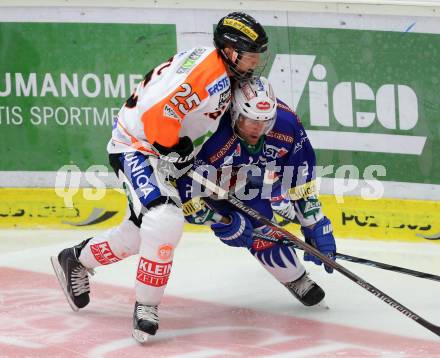 EBEL. Eishockey Bundesliga. EC VSV gegen Moser Medical Graz 99ers.  Cole Jarrett, (VSV), Jake Marto  (Graz). Villach, am 19.9.2014.
Foto: Kuess 


---
pressefotos, pressefotografie, kuess, qs, qspictures, sport, bild, bilder, bilddatenbank