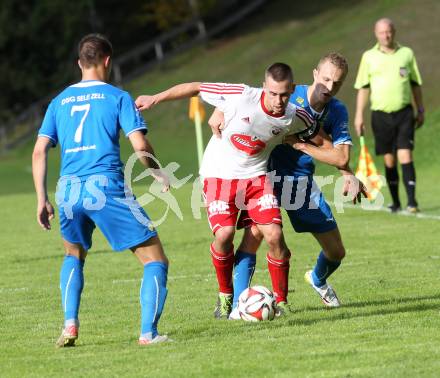 Fussball. Unterliga Ost. Sele Zell gegen Ludmannsdorf. Zan Kramar (Zell), Gerfried Einspieler (Ludmannsdorf). Zell, 21.9.2014.
Foto: Kuess
---
pressefotos, pressefotografie, kuess, qs, qspictures, sport, bild, bilder, bilddatenbank