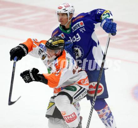 EBEL. Eishockey Bundesliga. EC VSV gegen Moser Medical Graz 99ers.  Geoff Waugh, (VSV), Anders Bastiansen  (Graz). Villach, am 19.9.2014.
Foto: Kuess 


---
pressefotos, pressefotografie, kuess, qs, qspictures, sport, bild, bilder, bilddatenbank