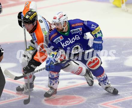 EBEL. Eishockey Bundesliga. EC VSV gegen Moser Medical Graz 99ers.  Sean Ringrose,  (VSV), Anders Bastiansen (Graz). Villach, am 19.9.2014.
Foto: Kuess 


---
pressefotos, pressefotografie, kuess, qs, qspictures, sport, bild, bilder, bilddatenbank