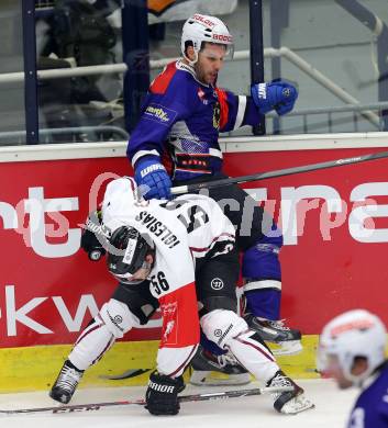 Eishockey. Champions Hockey League VSV gegen Geneve-Servette. Francois Fortier #15,  (VSV), Frederic Iglesias #56 (Geneve-Servette). Villach, 23.9.2014.
Foto: Kuess 
---
pressefotos, pressefotografie, kuess, qs, qspictures, sport, bild, bilder, bilddatenbank