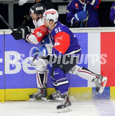 Eishockey. Champions Hockey League VSV gegen Geneve-Servette. Eric Hunter #51, (VSV), Daniel Rubin #40  (Geneve-Servette). Villach, 23.9.2014.
Foto: Kuess 
---
pressefotos, pressefotografie, kuess, qs, qspictures, sport, bild, bilder, bilddatenbank