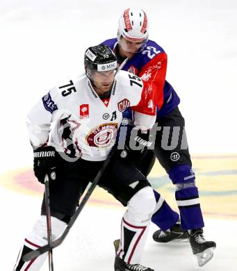 Eishockey. Champions Hockey League VSV gegen Geneve-Servette. Adis Alagic #22, (VSV), Paul Ranger #75  (Geneve-Servette). Villach, 23.9.2014.
Foto: Kuess 
---
pressefotos, pressefotografie, kuess, qs, qspictures, sport, bild, bilder, bilddatenbank