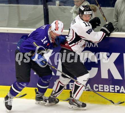 Eishockey. Champions Hockey League VSV gegen Geneve-Servette. Philipp Siutz #14,  (VSV), Tommy Pyatt #11 (Geneve-Servette). Villach, 23.9.2014.
Foto: Kuess 
---
pressefotos, pressefotografie, kuess, qs, qspictures, sport, bild, bilder, bilddatenbank