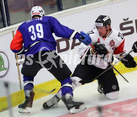 Eishockey. Champions Hockey League VSV gegen Geneve-Servette. Patrick Platzer #39, (VSV), Jonathan Mercier #22  (Geneve-Servette). Villach, 23.9.2014.
Foto: Kuess 
---
pressefotos, pressefotografie, kuess, qs, qspictures, sport, bild, bilder, bilddatenbank