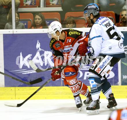 EBEL. Eishockey Bundesliga. KAC gegen EHC LIWEST Linz.  Jamie Lundmark, (KAC), Franklin MacDonald (Linz). Klagenfurt, am 25.9.2014.
Foto: Kuess 

---
pressefotos, pressefotografie, kuess, qs, qspictures, sport, bild, bilder, bilddatenbank