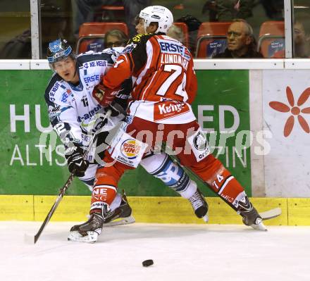 EBEL. Eishockey Bundesliga. KAC gegen EHC LIWEST Linz. Jamie Lundmark,  (KAC),  Chad Rau (Linz). Klagenfurt, am 25.9.2014.
Foto: Kuess 

---
pressefotos, pressefotografie, kuess, qs, qspictures, sport, bild, bilder, bilddatenbank