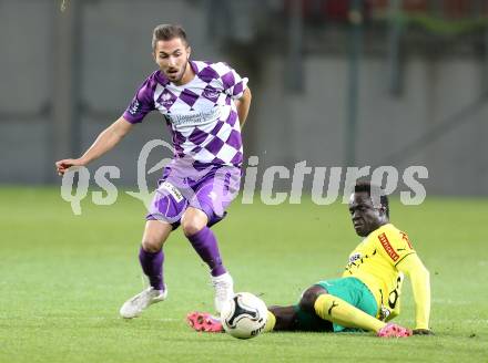 Fussball Regionalliga. SK Austria Klagenfurt gegen Voecklamarkt. Ali Hamdemir, (Austria Klagenfurt), Landing Goudiaby  (Voecklamarkt). Klagenfurt, 26.9.2014.
Foto: Kuess
---
pressefotos, pressefotografie, kuess, qs, qspictures, sport, bild, bilder, bilddatenbank