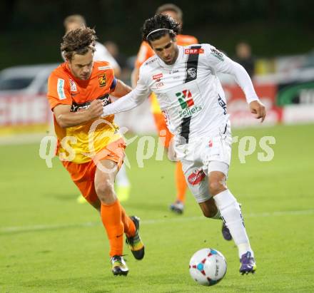 Fussball Bundesliga. RZ Pellets WAC gegen FC Admira Wacker Moedling. Jacobo Ynclan Pajares, (WAC), Richard Windbichler (Admira). Klagenfurt, am 27.9.2014.
Foto: Kuess

---
pressefotos, pressefotografie, kuess, qs, qspictures, sport, bild, bilder, bilddatenbank