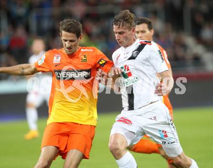 Fussball Bundesliga. RZ Pellets WAC gegen FC Admira Wacker Moedling. Tadej Trdina,  (WAC), Christoph Schoesswendter (Admira). Klagenfurt, am 27.9.2014.
Foto: Kuess

---
pressefotos, pressefotografie, kuess, qs, qspictures, sport, bild, bilder, bilddatenbank