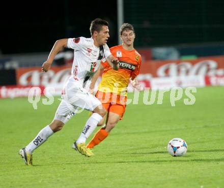 Fussball Bundesliga. RZ Pellets WAC gegen FC Admira Wacker Moedling. Rene Seebacher, (WAC), Stephan Auer (Admira). Klagenfurt, am 27.9.2014.
Foto: Kuess

---
pressefotos, pressefotografie, kuess, qs, qspictures, sport, bild, bilder, bilddatenbank