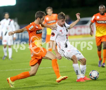 Fussball Bundesliga. RZ Pellets WAC gegen FC Admira Wacker Moedling. Tadej Trdina, (WAC), Christoph Schoesswendter (Admira). Klagenfurt, am 27.9.2014.
Foto: Kuess

---
pressefotos, pressefotografie, kuess, qs, qspictures, sport, bild, bilder, bilddatenbank