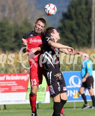 Fussball Unterliga Ost. Woelfnitz gegen Kraig. Guido Lambacher, (Woelfnitz),  Michael Salbrechter (Kraig). Woelfnitz, am 27.9.2014.
Foto: Kuess
---
pressefotos, pressefotografie, kuess, qs, qspictures, sport, bild, bilder, bilddatenbank