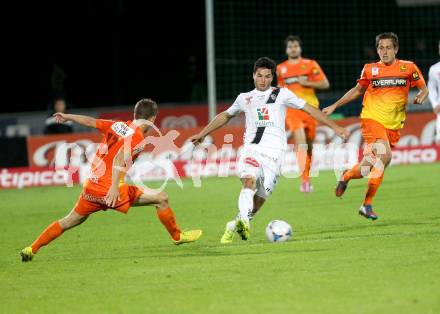 Fussball Bundesliga. RZ Pellets WAC gegen FC Admira Wacker Moedling. Roland Putsche, (WAC), Stephan Auer  (Admira). Klagenfurt, am 27.9.2014.
Foto: Kuess

---
pressefotos, pressefotografie, kuess, qs, qspictures, sport, bild, bilder, bilddatenbank