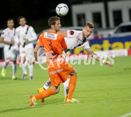 Fussball Bundesliga. RZ Pellets WAC gegen FC Admira Wacker Moedling. Peter Zulj (WAC), Christoph Schoesswendter (Admira). Klagenfurt, am 27.9.2014.
Foto: Kuess

---
pressefotos, pressefotografie, kuess, qs, qspictures, sport, bild, bilder, bilddatenbank