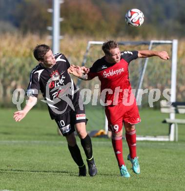 Fussball Unterliga Ost. Woelfnitz gegen Kraig. Andreas Bernhard Schritliser, (Woelfnitz),  Michael Salbrechter (Kraig). Woelfnitz, am 27.9.2014.
Foto: Kuess
---
pressefotos, pressefotografie, kuess, qs, qspictures, sport, bild, bilder, bilddatenbank