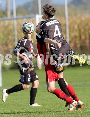 Fussball Unterliga Ost. Woelfnitz gegen Kraig. Daniel Zlattinger,  (Woelfnitz),  Christian Groinig (Kraig). Woelfnitz, am 27.9.2014.
Foto: Kuess
---
pressefotos, pressefotografie, kuess, qs, qspictures, sport, bild, bilder, bilddatenbank