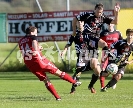 Fussball Unterliga Ost. Woelfnitz gegen Kraig. Stefan Maurer, (Woelfnitz),  Christoph Maximilian Fruehstueck  (Kraig). Woelfnitz, am 27.9.2014.
Foto: Kuess
---
pressefotos, pressefotografie, kuess, qs, qspictures, sport, bild, bilder, bilddatenbank