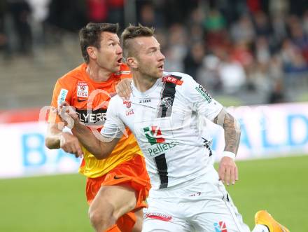 Fussball Bundesliga. RZ Pellets WAC gegen FC Admira Wacker Moedling. Peter Zulj, (WAC), Markus Katzer  (Admira). Klagenfurt, am 27.9.2014.
Foto: Kuess

---
pressefotos, pressefotografie, kuess, qs, qspictures, sport, bild, bilder, bilddatenbank