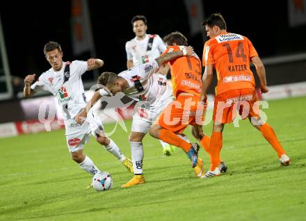 Fussball Bundesliga. RZ Pellets WAC gegen FC Admira Wacker Moedling. Roland Putsche, Rene Seebacher,  (WAC), Markus Katzer, Lukas Thuerauer (Admira). Klagenfurt, am 27.9.2014.
Foto: Kuess

---
pressefotos, pressefotografie, kuess, qs, qspictures, sport, bild, bilder, bilddatenbank