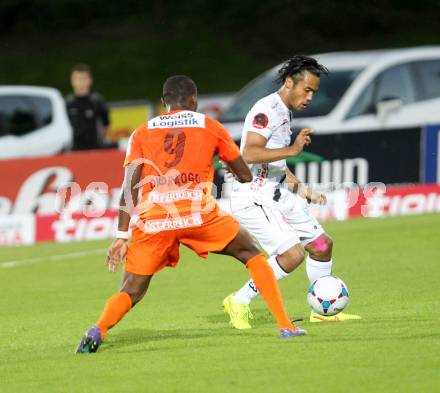 Fussball Bundesliga. RZ Pellets WAC gegen FC Admira Wacker Moedling. Stephan Palla, (WAC), Issiaka Ouedraogo  (Admira). Klagenfurt, am 27.9.2014.
Foto: Kuess

---
pressefotos, pressefotografie, kuess, qs, qspictures, sport, bild, bilder, bilddatenbank