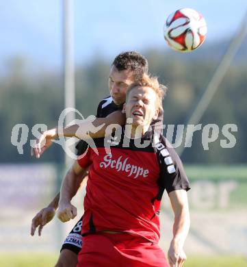 Fussball Unterliga Ost. Woelfnitz gegen Kraig. Matthias Kales (Woelfnitz), Christoph Maximilian Fruehstueck (Kraig). Woelfnitz, am 27.9.2014.
Foto: Kuess
---
pressefotos, pressefotografie, kuess, qs, qspictures, sport, bild, bilder, bilddatenbank