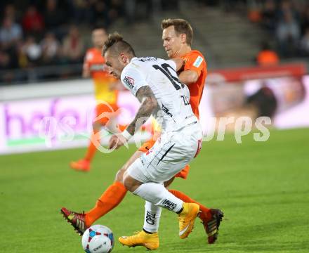 Fussball Bundesliga. RZ Pellets WAC gegen FC Admira Wacker Moedling. Peter Zulj,  (WAC), Daniel Toth (Admira). Klagenfurt, am 27.9.2014.
Foto: Kuess

---
pressefotos, pressefotografie, kuess, qs, qspictures, sport, bild, bilder, bilddatenbank