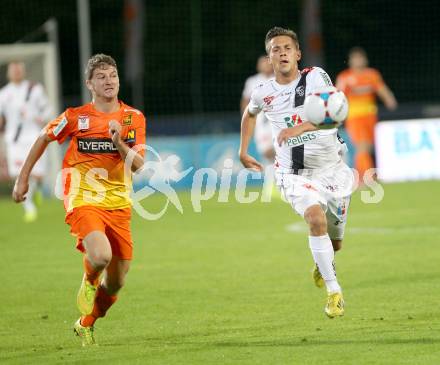 Fussball Bundesliga. RZ Pellets WAC gegen FC Admira Wacker Moedling. Rene Seebacher, (WAC), Stephan Auer  (Admira). Klagenfurt, am 27.9.2014.
Foto: Kuess

---
pressefotos, pressefotografie, kuess, qs, qspictures, sport, bild, bilder, bilddatenbank