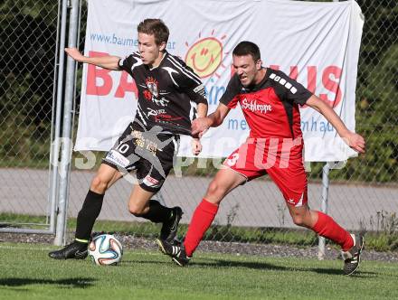 Fussball Unterliga Ost. Woelfnitz gegen Kraig. Guido Lambacher,  (Woelfnitz), Michael Salbrechter (Kraig). Woelfnitz, am 27.9.2014.
Foto: Kuess
---
pressefotos, pressefotografie, kuess, qs, qspictures, sport, bild, bilder, bilddatenbank