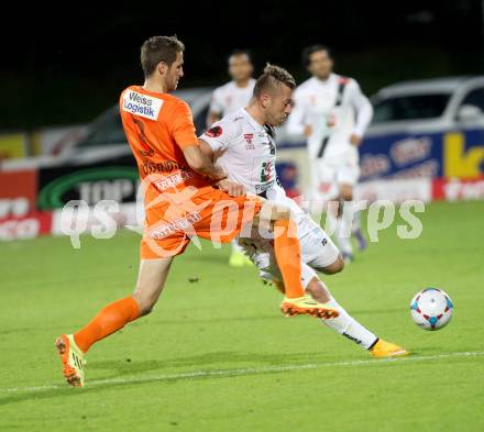 Fussball Bundesliga. RZ Pellets WAC gegen FC Admira Wacker Moedling. Peter Zulj (WAC), Christoph Schoesswendter (Admira). Klagenfurt, am 27.9.2014.
Foto: Kuess

---
pressefotos, pressefotografie, kuess, qs, qspictures, sport, bild, bilder, bilddatenbank