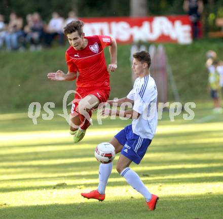 Fussball. Kaerntner Liga. Atus Ferlach gegen Treibach. Martin Sustersic (Ferlach), Lukas Rabitsch (Treibach). Ferlach, 28.9.2014.
Foto: Kuess
---
pressefotos, pressefotografie, kuess, qs, qspictures, sport, bild, bilder, bilddatenbank