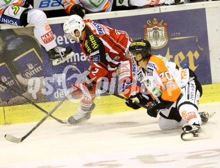 EBEL. Eishockey Bundesliga. KAC gegen Moser Medical Graz 99ers. Kyle Wharton, (KAC),  Roberts Jekimovs (Graz). Klagenfurt, am 28.9.2014.
Foto: Kuess 

---
pressefotos, pressefotografie, kuess, qs, qspictures, sport, bild, bilder, bilddatenbank