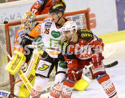 EBEL. Eishockey Bundesliga. KAC gegen Moser Medical Graz 99ers. Martin Schumnig,  (KAC), Jake Marto (Graz). Klagenfurt, am 28.9.2014.
Foto: Kuess 

---
pressefotos, pressefotografie, kuess, qs, qspictures, sport, bild, bilder, bilddatenbank