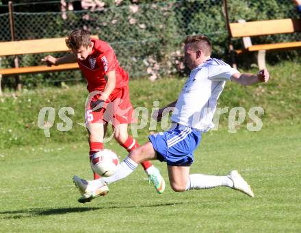 Fussball. Kaerntner Liga. Atus Ferlach gegen Treibach. Daniel Jobst (Ferlach), Stephan Kleedorfer (Treibach). Ferlach, 28.9.2014.
Foto: Kuess
---
pressefotos, pressefotografie, kuess, qs, qspictures, sport, bild, bilder, bilddatenbank