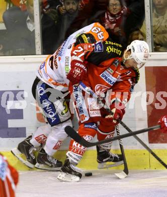 EBEL. Eishockey Bundesliga. KAC gegen Moser Medical Graz 99ers. Geier Manuel,  (KAC), Petri Lammassaari (Graz). Klagenfurt, am 28.9.2014.
Foto: Kuess 

---
pressefotos, pressefotografie, kuess, qs, qspictures, sport, bild, bilder, bilddatenbank