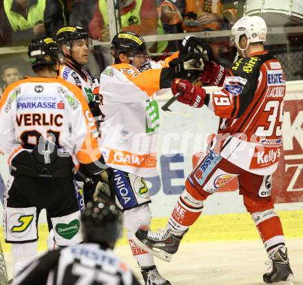 EBEL. Eishockey Bundesliga. KAC gegen Moser Medical Graz 99ers. Jean Francois Jaques,  (KAC), Clemens Unterweger (Graz). Klagenfurt, am 28.9.2014.
Foto: Kuess 

---
pressefotos, pressefotografie, kuess, qs, qspictures, sport, bild, bilder, bilddatenbank