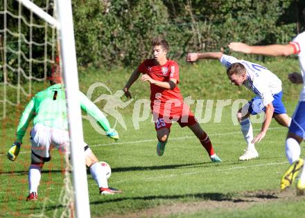 Fussball. Kaerntner Liga. Atus Ferlach gegen Treibach. Daniel Jobst (Ferlach), Stephan Kleedorfer (Treibach). Ferlach, 28.9.2014.
Foto: Kuess
---
pressefotos, pressefotografie, kuess, qs, qspictures, sport, bild, bilder, bilddatenbank