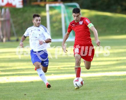 Fussball. Kaerntner Liga. Atus Ferlach gegen Treibach. Lukas Jaklitsch (Ferlach), Yosifov Svetlozar Angelov (Treibach). Ferlach, 28.9.2014.
Foto: Kuess
---
pressefotos, pressefotografie, kuess, qs, qspictures, sport, bild, bilder, bilddatenbank