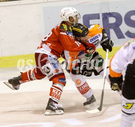 EBEL. Eishockey Bundesliga. KAC gegen Moser Medical Graz 99ers. Thomas Koch, (KAC), Jesse Mathias Jyrkkioe  (Graz). Klagenfurt, am 28.9.2014.
Foto: Kuess 

---
pressefotos, pressefotografie, kuess, qs, qspictures, sport, bild, bilder, bilddatenbank