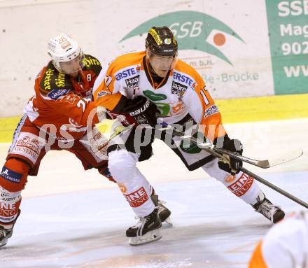 EBEL. Eishockey Bundesliga. KAC gegen Moser Medical Graz 99ers. Martin Schumnig,  (KAC), Manuel Ganahl (Graz). Klagenfurt, am 28.9.2014.
Foto: Kuess 

---
pressefotos, pressefotografie, kuess, qs, qspictures, sport, bild, bilder, bilddatenbank