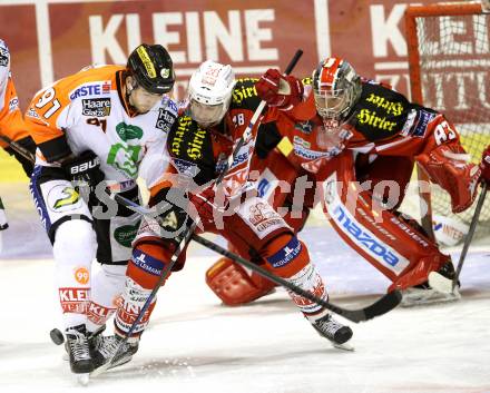 EBEL. Eishockey Bundesliga. KAC gegen Moser Medical Graz 99ers. Martin Schumnig,  (KAC), Miha Verlic (Graz). Klagenfurt, am 28.9.2014.
Foto: Kuess 

---
pressefotos, pressefotografie, kuess, qs, qspictures, sport, bild, bilder, bilddatenbank