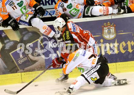 EBEL. Eishockey Bundesliga. KAC gegen Moser Medical Graz 99ers.  Kyle Wharton, (KAC),   Roberts Jekimovs  (Graz). Klagenfurt, am 28.9.2014.
Foto: Kuess 

---
pressefotos, pressefotografie, kuess, qs, qspictures, sport, bild, bilder, bilddatenbank