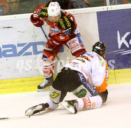 EBEL. Eishockey Bundesliga. KAC gegen Moser Medical Graz 99ers. Thomas Koch,  (KAC), Clemens Unterweger (Graz). Klagenfurt, am 28.9.2014.
Foto: Kuess 

---
pressefotos, pressefotografie, kuess, qs, qspictures, sport, bild, bilder, bilddatenbank