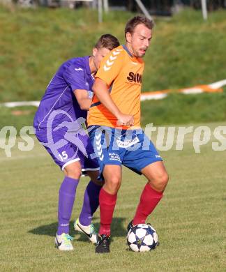 Fussball Unterliga Ost. SPG FC Poggersdorf KM gegen Globasnitz. Juergen Florian Glaboniat (Poggersdorf), Stefan Friessnegger (Globasnitz). Poggersdorf, 5.10.2014.
Foto: Kuess
---
pressefotos, pressefotografie, kuess, qs, qspictures, sport, bild, bilder, bilddatenbank