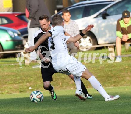 Fussball. 1. Klasse B2. Fuernitz gegen Keutschach. Franz Uebleis (Fuernitz), Stephan Krumpl (Keutschach).  Fuernitz, 4.10.2014.
Foto: Kuess
---
pressefotos, pressefotografie, kuess, qs, qspictures, sport, bild, bilder, bilddatenbank