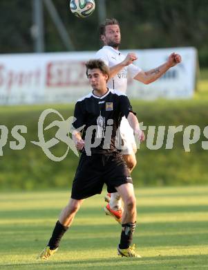 Fussball. 1. Klasse B2. Fuernitz gegen Keutschach. Lukas Truppe, (Fuernitz), Florian Wallenko (Keutschach).  Fuernitz, 4.10.2014.
Foto: Kuess
---
pressefotos, pressefotografie, kuess, qs, qspictures, sport, bild, bilder, bilddatenbank