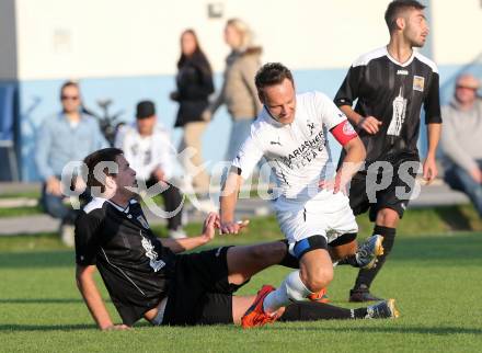 Fussball. 1. Klasse B2. Fuernitz gegen Keutschach. Markus Alois Tschinderle, (Fuernitz), Peter Kolter (Keutschach).  Fuernitz, 4.10.2014.
Foto: Kuess
---
pressefotos, pressefotografie, kuess, qs, qspictures, sport, bild, bilder, bilddatenbank