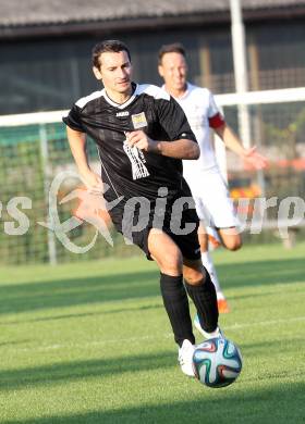 Fussball. 1. Klasse B2. Fuernitz gegen Keutschach. Alexander Heinrich Rigelnik (Keutschach).  Fuernitz, 4.10.2014.
Foto: Kuess
---
pressefotos, pressefotografie, kuess, qs, qspictures, sport, bild, bilder, bilddatenbank