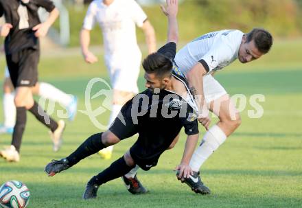 Fussball. 1. Klasse B2. Fuernitz gegen Keutschach. Miha Znidarsic, (Fuernitz), Fatih Tenekeci  (Keutschach).  Fuernitz, 4.10.2014.
Foto: Kuess
---
pressefotos, pressefotografie, kuess, qs, qspictures, sport, bild, bilder, bilddatenbank